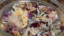 a jar filled with dried herbs